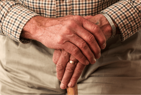 Elderly holding a cane