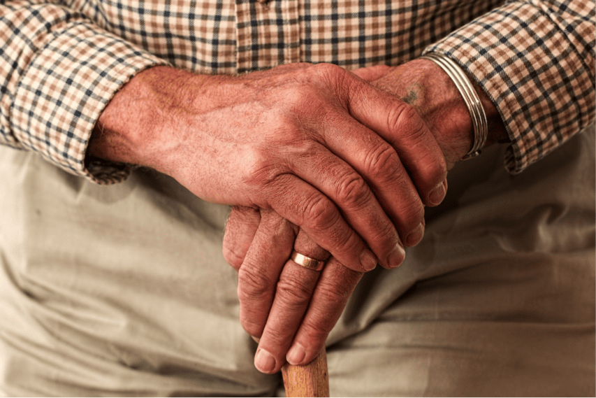 Elderly holding a cane